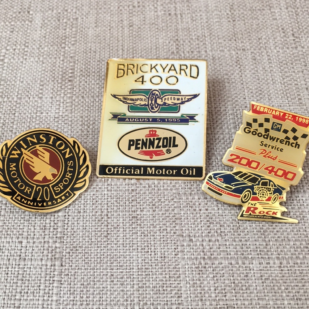 Set of there racing pins